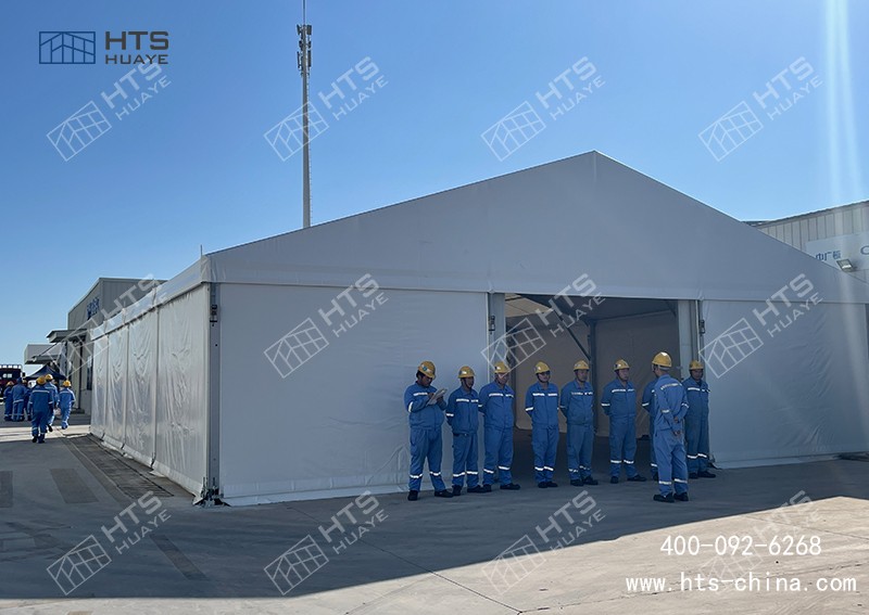 倉庫滿了不用慌，只要廠區(qū)有空地用拼裝篷房倉庫短期快速搭建使用